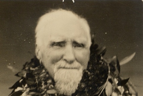 A man wearing leis (ddr-njpa-1-404)