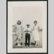 Three people outside (ddr-densho-378-859)