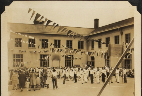 Exercise class in courtyard (ddr-densho-423-529)