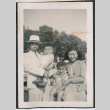 Photo of a family of four (ddr-densho-483-833)