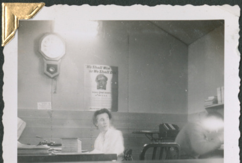 Woman seated at desk (ddr-densho-434-184)