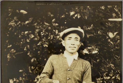 Rifue Kanehashi holding a basket of vegetables (ddr-njpa-5-470)