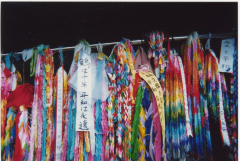 Rows of Tsurus hanging along wall (ddr-densho-426-522)