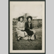 Two women pose on box (ddr-densho-359-168)