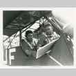 Staff Sergeant Arata Kimura, 522nd Field Artillery Battalion, and Cub Pilot Lieutenant Joseph C. Polancii in plane (ddr-densho-1007-144)
