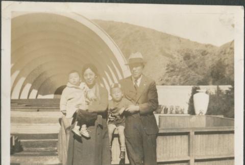 A family at an outdoor event space (ddr-densho-321-723)