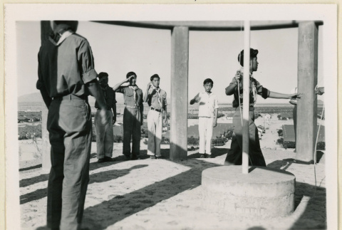 Boy Scouts at monument flag pole (ddr-densho-37-1469)