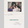 Christmas card with 5 people in front of a Christmas tree (ddr-densho-430-270)
