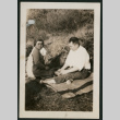 Man and women relax on blanket (ddr-densho-359-696)