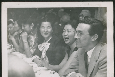 Group sitting at a table (ddr-densho-293-155)