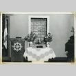 Altar with offerings at the Manzanar Buddhist Church (ddr-manz-4-200)