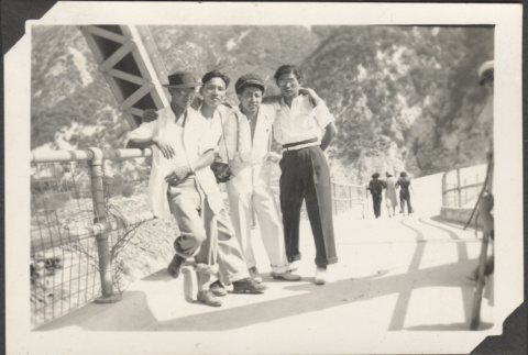 Four men on bridge (ddr-densho-326-618)