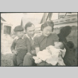Chester, Agnes and Jon David Sakura with baby Gary (Gerald) Sakura (ddr-densho-523-88)