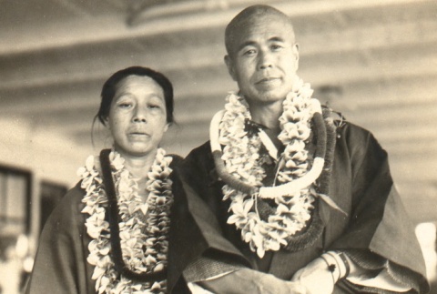 Man and woman wearing leis (ddr-njpa-4-1440)