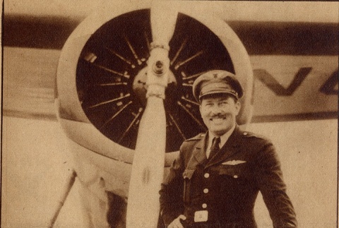 Roscoe Turner standing with trophies in front of his plane (ddr-njpa-1-2132)