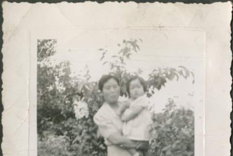 Momoye Tanaka holding Lois Sakahara (ddr-densho-316-30)