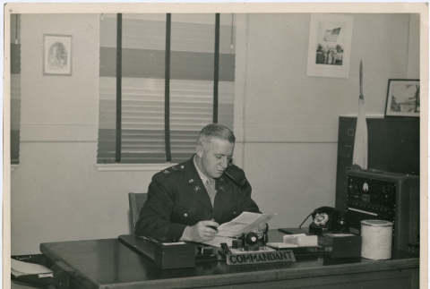 Commandant at his desk (ddr-densho-397-33)