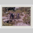 Men in Japanese garden (ddr-densho-359-1274)
