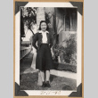 Girl by a tree (ddr-densho-542-217)