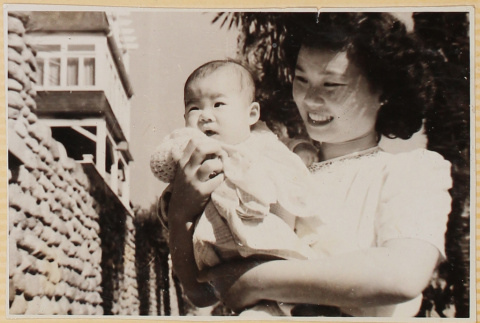 Woman holding baby (ddr-densho-522-34)