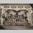 Group photograph of Japanese men and women with Hinomaru (ddr-densho-259-178)