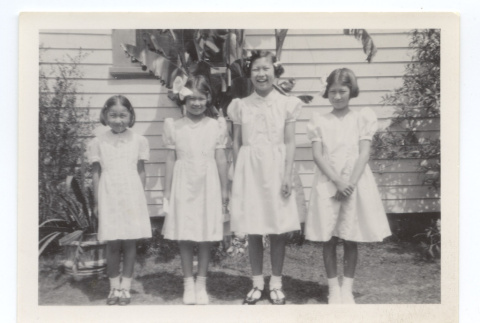 Four girls in dresses (ddr-one-6-5)