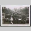 Photo of five children sitting on a park bench (ddr-densho-483-326)