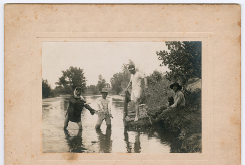 Four men fishing (ddr-densho-546-5)