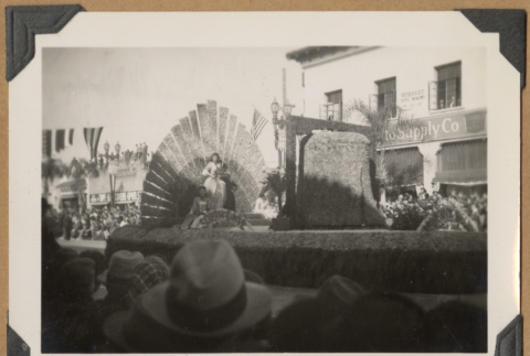 Two women on a parade float (ddr-densho-542-44)