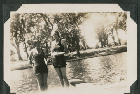 two women in swimsuits at a river (ddr-densho-378-504)