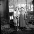 Two women standing by building (ddr-densho-426-300)