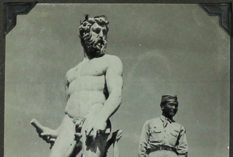 Soldier next to statues (ddr-densho-201-263)