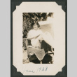 woman in wicker chair (ddr-densho-378-474)