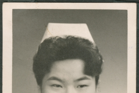 Portrait of woman in nurse's uniform (ddr-densho-316-323)