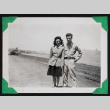 Man and woman pose in front of a bridge (ddr-densho-404-193)