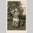 Child posing in costume (ddr-densho-430-312)