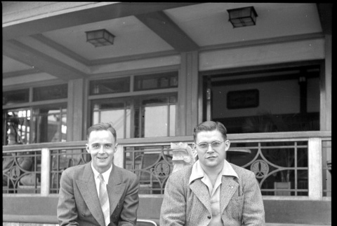 Two men seated by fountain (ddr-densho-426-266)