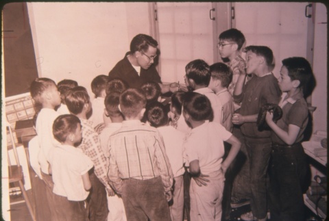 Man with children in classroom (ddr-densho-330-175)