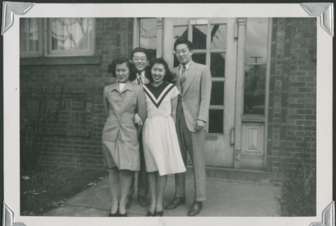 Friends in front of a building (ddr-densho-298-147)