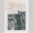 Man standing on deck of ship (ddr-densho-332-29)