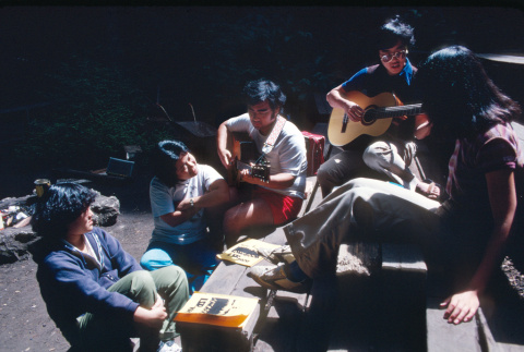 Campers playing guitar (ddr-densho-336-1302)