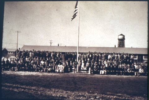 Large crowd with American flag (ddr-densho-1007-628)