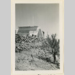 Man works on a monument (ddr-densho-37-1090)