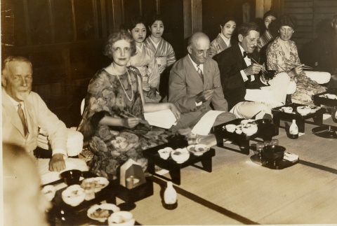 Patrick Hurley and his wife eating Japanese food (ddr-njpa-1-699)