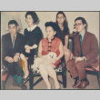 Five people, woman in center with dog (ddr-densho-523-599)