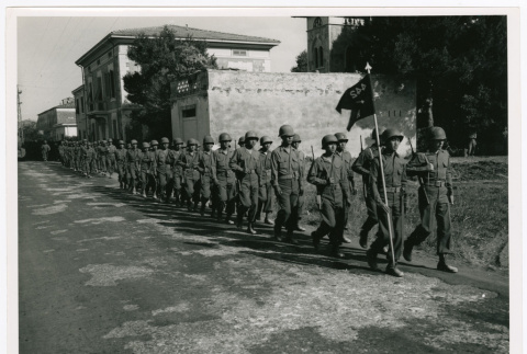 Members of the 100th Infantry Battalion marching in Vada, Italy (ddr-densho-1007-145)