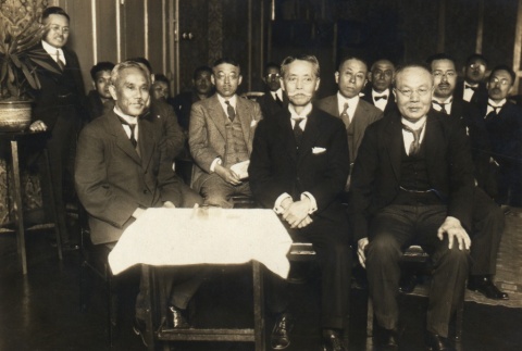 Yukio Ozaki and a group of men seated in a room (ddr-njpa-4-1240)