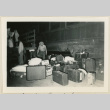 Unloading baggage at Casa Grande train station (ddr-densho-37-893)