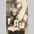 Sumo wrestler posing with trophy (ddr-njpa-4-2149)