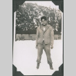 Man in fatigues standing in snow (ddr-ajah-2-274)